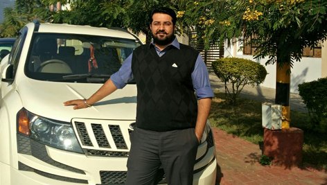 Abhishek Singh with his Mahindra XUV