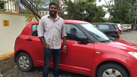 Stanley Jose with his Maruti Swift