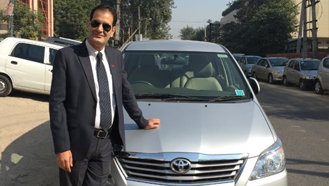 Naveen Wazir with his Toyota Innova
